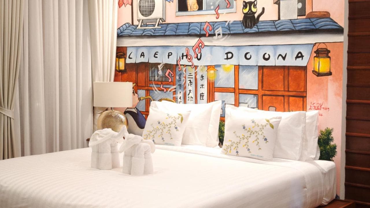 Deluxe Double Room at Doona Resort with a hand-painted Doona mural